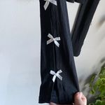 Chic Black Long Sleeve Top with White Bow Details Size M Photo 2