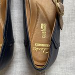 Clarks  Helina Amo Mary Jane flat in navy blue leather with a gold-tone strap. Photo 6