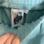 QUEEN OF SPARKLES Blue Shorts with Rainbow Sequin Trim Photo 1