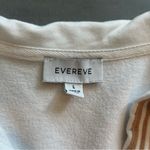 Evereve  White Sleeveless Polo with Beige Striped Details Photo 2