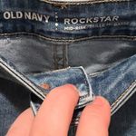 Old Navy  midrise Rockstar medium wash jeans size 12 Photo 6