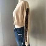 Kittenish  cropped long sleeve top Photo 2
