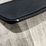 Cosmetic pouch in cat eye shape. Love Bravery by Lady Gaga and Elton John Black Photo 2