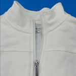 Karen Scott  White Vest Photo 3