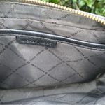 Michael Kors Women's Jet Set Crossbody Black/Gold Purse Photo 4