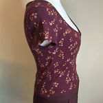 PacSun ’s Me to We Women’s Cropped Floral Print Cap Sleeve Zip Front Ribbed Top Photo 2