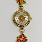 Women’s Poinsettia Quartz analog watch gold tone 25mm bracelet Size 7” running Photo 0