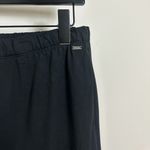 Vuori  Halo Modern Straight Leg Pants in Solid Black Size Medium Photo 4