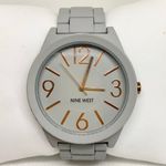 Nine West gray tone 42mm quartz analog gold tone indices size 7” running Photo 0