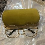 Gucci  Demo Round Ladies Eyeglasses GG0596OA 003 58 Photo 1