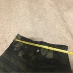 Lululemon  butterfly and striped Olive green and black leggings size 4 Photo 11
