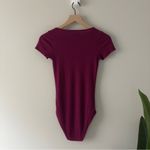 Hollister 3/4 Zip Ribbed Bodysuit Burgundy Purple Short sleeve round neck snaps Photo 1