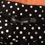 Pretty Little Thing Black Jersey Floaty Polka Dot Shorts Photo 6