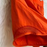 Tek Gear  orange athletic shorts Photo 1