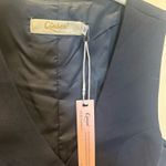 Amazon QINSEN Womens V Neck Vest Top Sleeveless Button Down Fully Lined Solid Going Out Crop Tops Photo 2