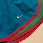 Nike neon blue athletic shorts Photo 1