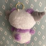 Hello Kitty  Kuromi Key Chain. Purple, white and gray in color. Photo 1