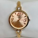 Studio women rose gold tone watch quartz analog 32mm cuff size 7” running Photo 0