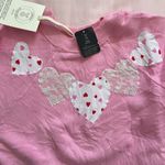 Urban Outfitters  pink heart sweater Photo 1