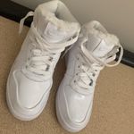 Nike White Hightops With Fur Tongue Photo 0