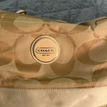 Coach  Beige Signature Shoulder Hobo bag.  Beige/Tan Photo 1