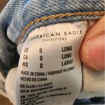 American Eagle high rise mom jeans light wash Distressed size 0 long Photo 4