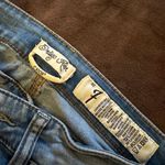 indigo. Rain Crop Women's Medium Wash Ripped Distressed Denim Jeans Photo 1