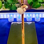 A sweet little heart charm or keychain with tiny pearls on it. The picture doesn’t do it justice. Smoke free home. Photo 1