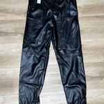 AQUA Women's Black Faux Leather Elastic Waist/Ankle Pull On Jogger Pants sz S Photo 3