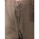 Levi's Levi’s olive green flat-front chino shorts. Button and zip fly closure, belt loo Photo 8