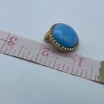 Vintage light blue acrylic button style earrings. Gold Photo 2