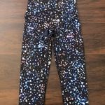 Spanx black galaxy star print crop leggings size M Photo 0