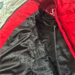 Guess  Red Puffer Jacket with Black Accents Photo 1