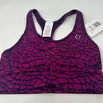 Moving Comfort  Switch it up Racer sports bra in Currant Woven size XS NWT Photo 0