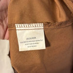 Saints + Secrets ‘Swiss Dot’ Ruffle Dress with Side Cut Outs and Deep Vneck Photo 8