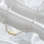 Elegant Gold and Pearl Cross Necklace Photo 0