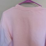 Nike pullover sweatshirt sweater in pink. Tags have been removed but this fits like a small. Photo 5