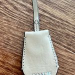 Coach cream leather purse hang tag Photo 0