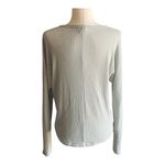 Sky And Sparrow TILLYS--WAFFLE KNIT TOP-SIZE SMALL Green waffle knit top, long sleeves, button front, ties at waist, oversized, excellent condition, size small Measurements: Bust: armpit to armpit 24-27 inches Length: shoulder seam to bottom Front: 20 inches Back: 23 inches Photo 3