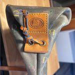 Dooney & Bourke black coated canvas shoulder bag with rainbow zipper Photo 2