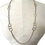 Long silver tone necklace with circles Photo 0