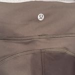 Lululemon Invigorate HR Crop 23” size 2 in dark olive Photo 7