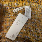 Japna  Women’s Small Yellow Off Shoulder Floral Smock Stretchy Pwplum Top Blouse Photo 4