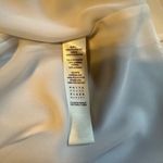 White House | Black Market  V-Neck Blouse with Black Embroidery Photo 8