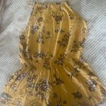 Brandy Melville Yellow Floral Romper Photo 1