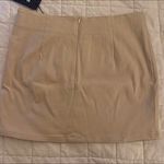 Motel  nude mini skirt  Photo 3