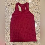 Athleta  Women's Red sleeveless Top branded momentum tank size small Photo 0