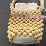 Aerie Beaded Bucket Bag Purse in Natural Photo 12