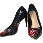 BCBGeneration Bcbg black heels with black and rose flower design overlay. Photo 4