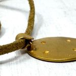 Mayan design gold tone pendant purchased in Costa Rica, on golden suede cord Photo 7